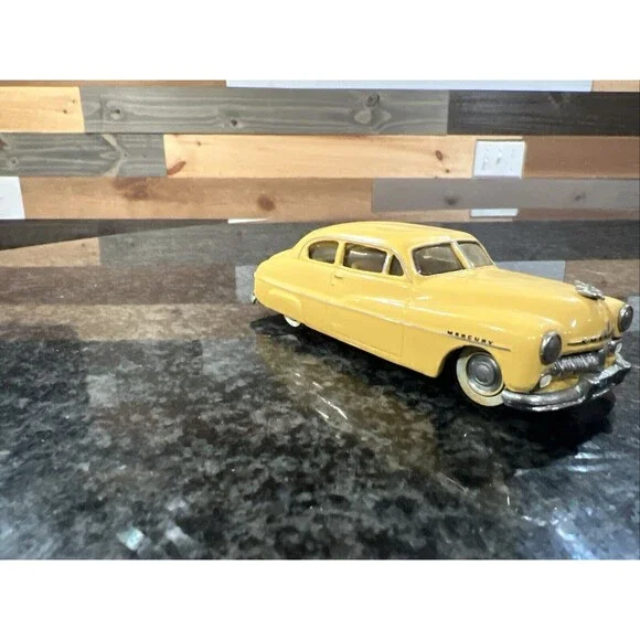 1:43 EMPIRE ZAUGG MODEL TIN WIZARD 6 MERCURY 51 1951 YELLOW